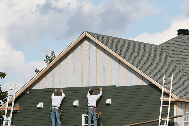 Professional Emergency Siding Repair technician working in New Springfield, OH